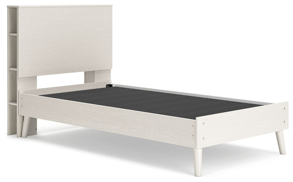 Cama con librero